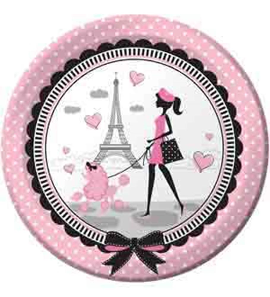 Round pink paper plate with white polka dots, featuring a black silhouette of a girl walking a pink poodle in front of the.