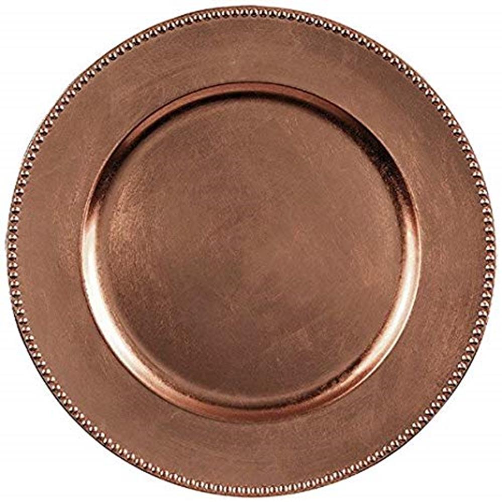 Round metallic rose gold charger plate with a beaded edge detail and smooth center.