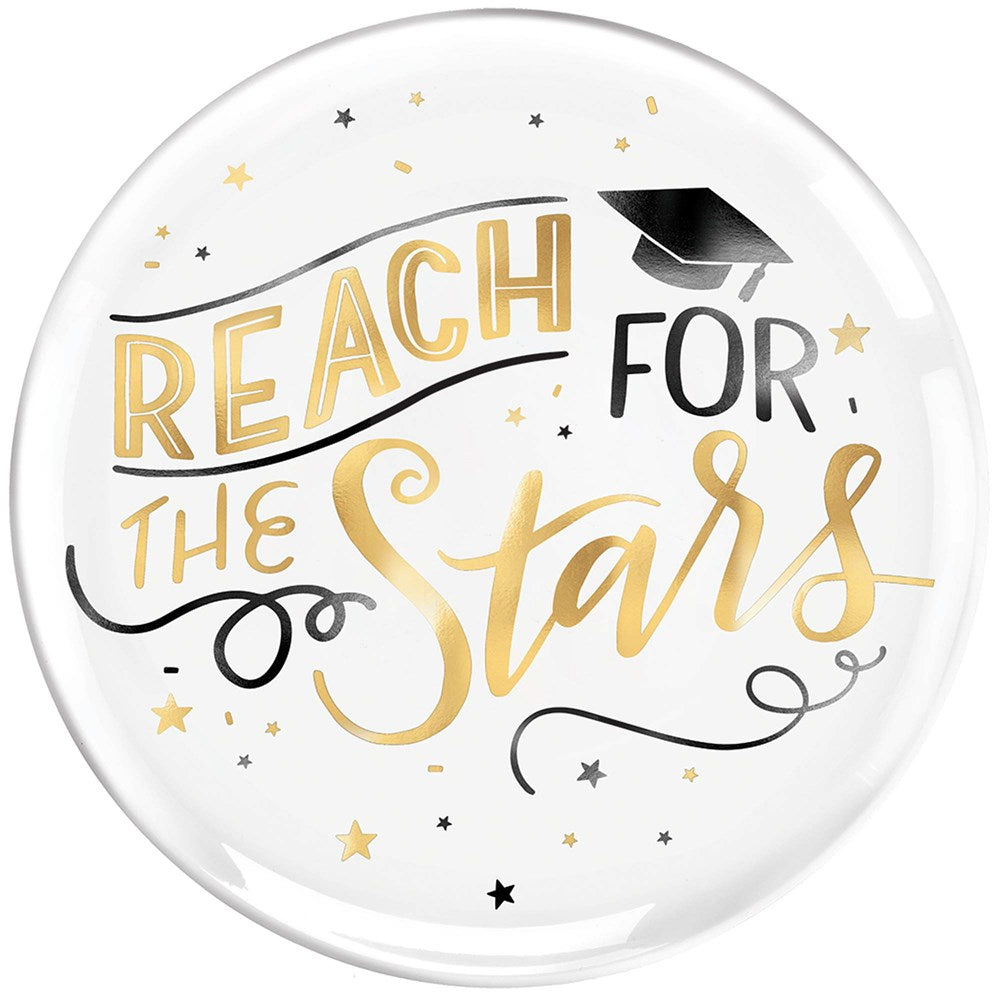White round platter with gold and black "Reach for the Stars" text, graduation cap, and star accents.