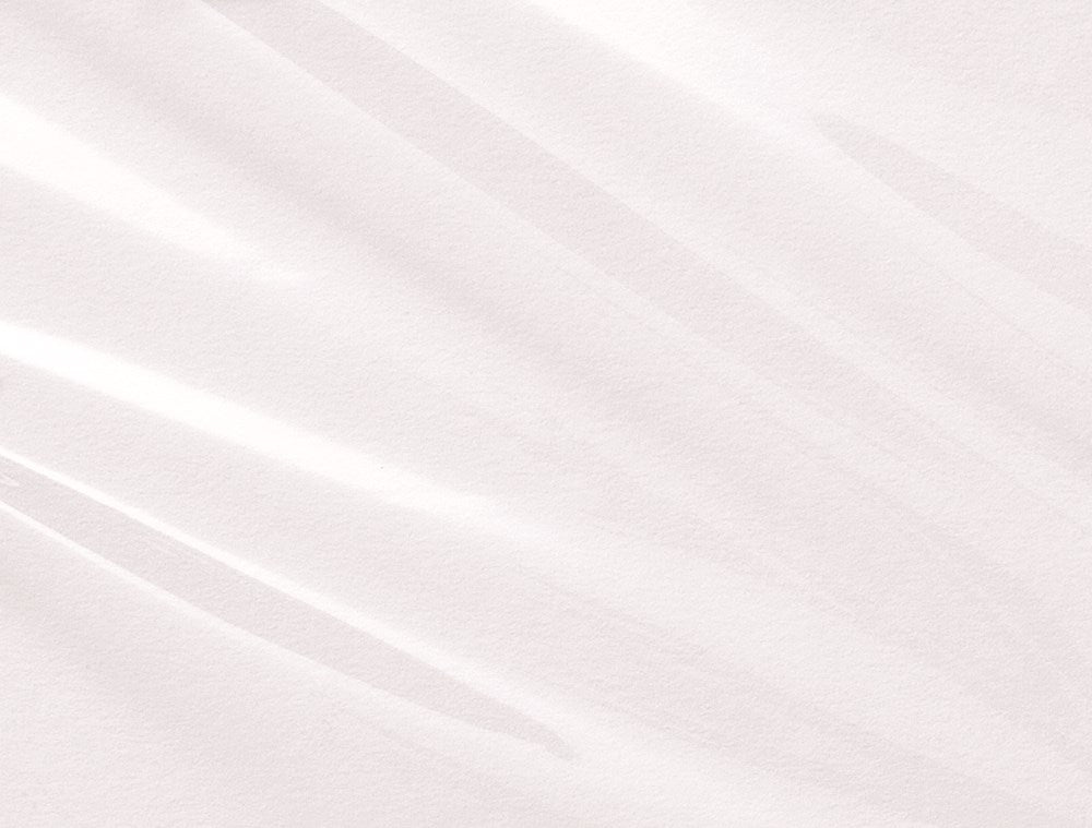 Clear, glossy transparent cello wrap sheet with smooth, crinkled texture.