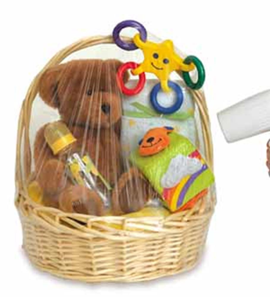 Clear shrink cello bag filled with a teddy bear, baby toy, and small colorful items in a woven basket.