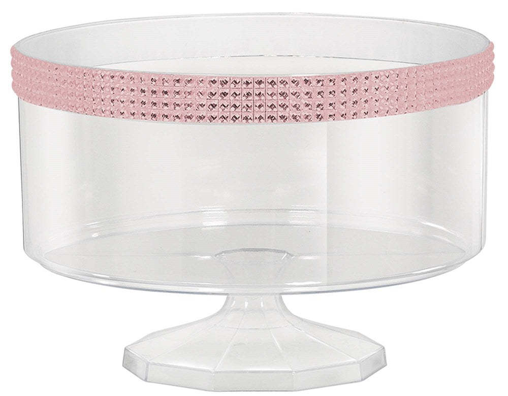 Clear round trifle container on a pedestal with a pink gem-studded decorative band around the top edge.