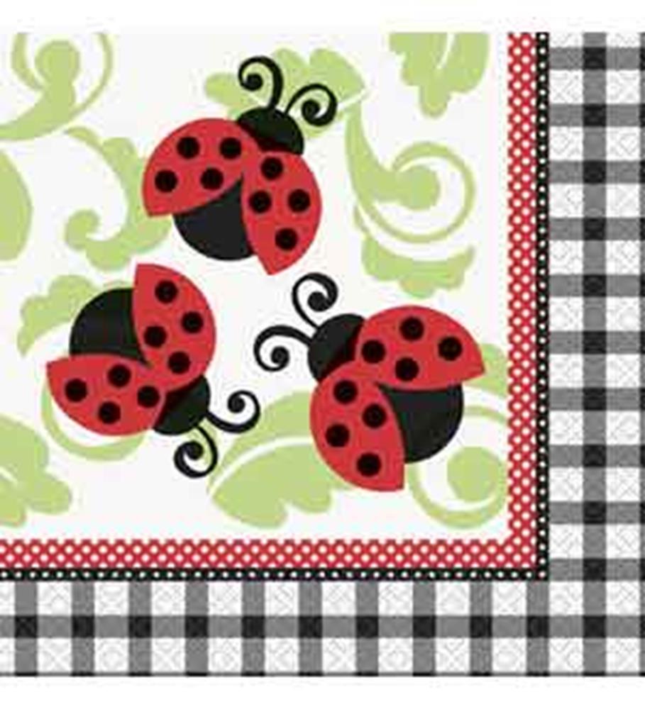 Napkins featuring red ladybugs with black spots and curly antennae on a white background with green swirls and a red polka.