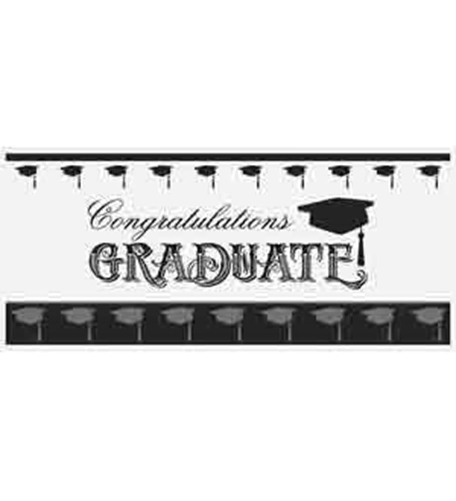 White rectangular banner with black text saying "Congratulations Graduate" and black graduation caps along the top and.