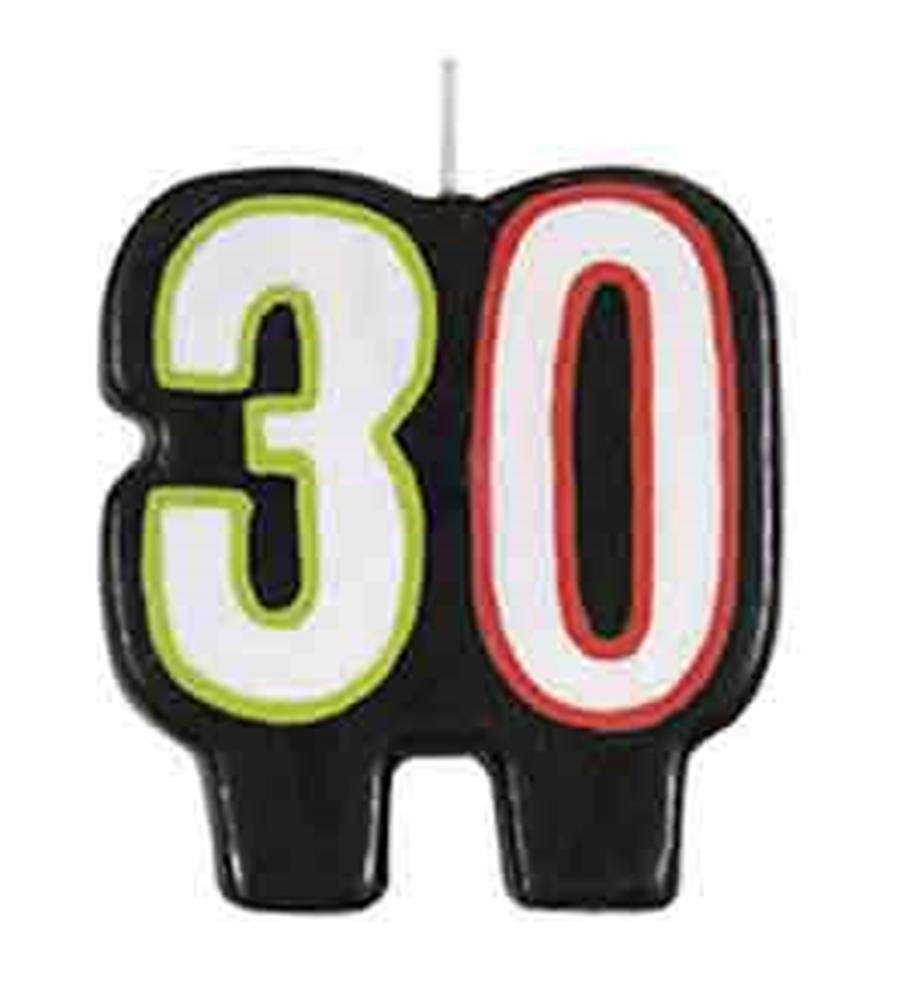 Black birthday candle shaped as the number 30 with green and red outlined digits and a white wick on top.