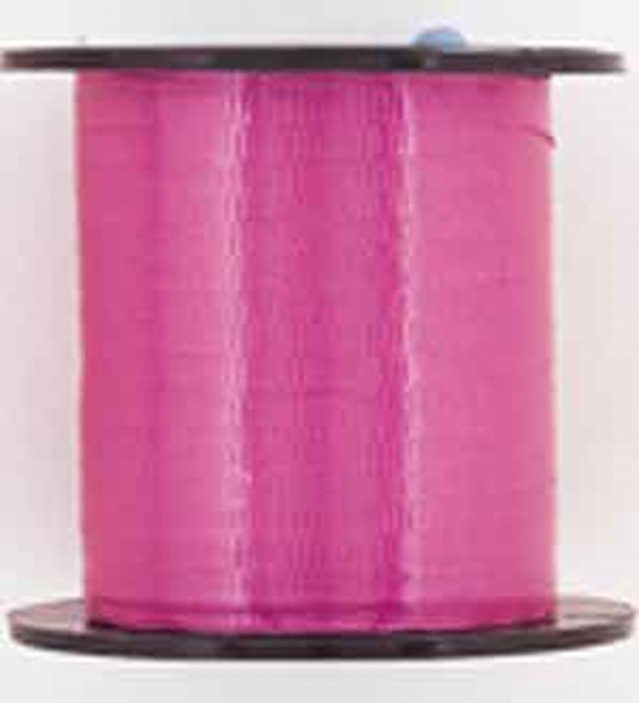 Spool of shiny magenta curling ribbon with a smooth, glossy texture on a black plastic reel.