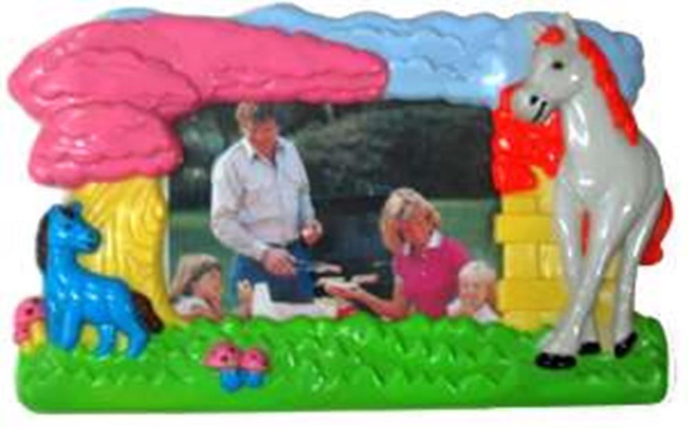 Colorful plastic photo frame featuring a large white horse with red mane and tail on the right and a smaller blue horse on.