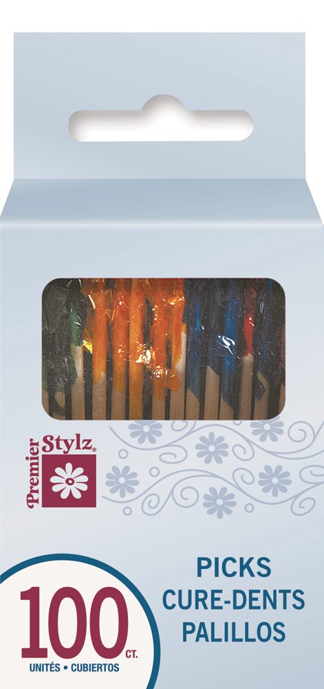 Clear plastic frill picks with orange, black, and blue decorative flair in white and blue box with window showing contents.
