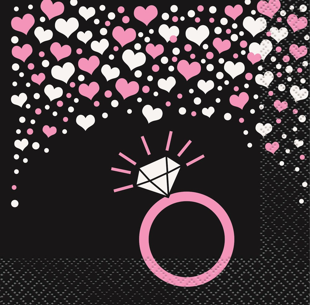 Square black napkin with scattered pink and white hearts and a pink diamond ring illustration in the center.