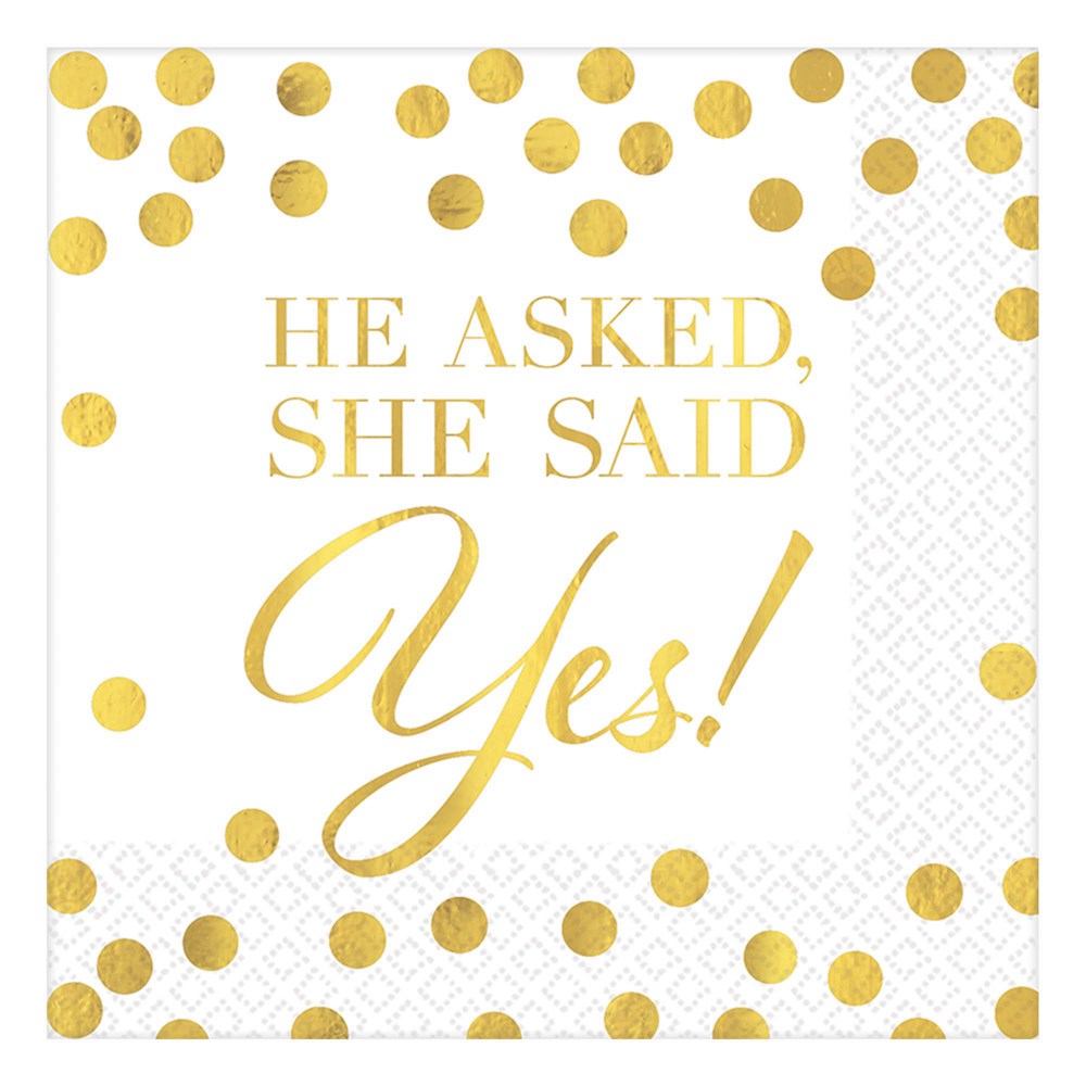 White beverage napkin with gold foil polka dots and "He Asked, She Said Yes!" text in gold script and serif font.