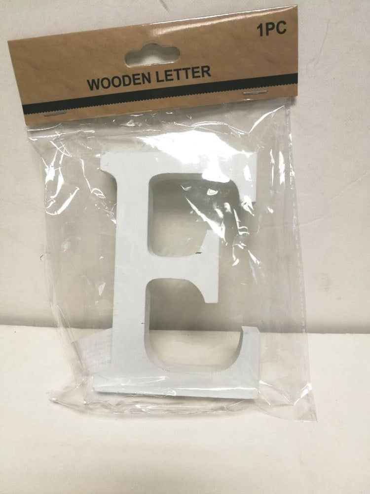 White wooden block letter E with smooth edges, packaged in clear plastic wrap with a brown cardboard header.