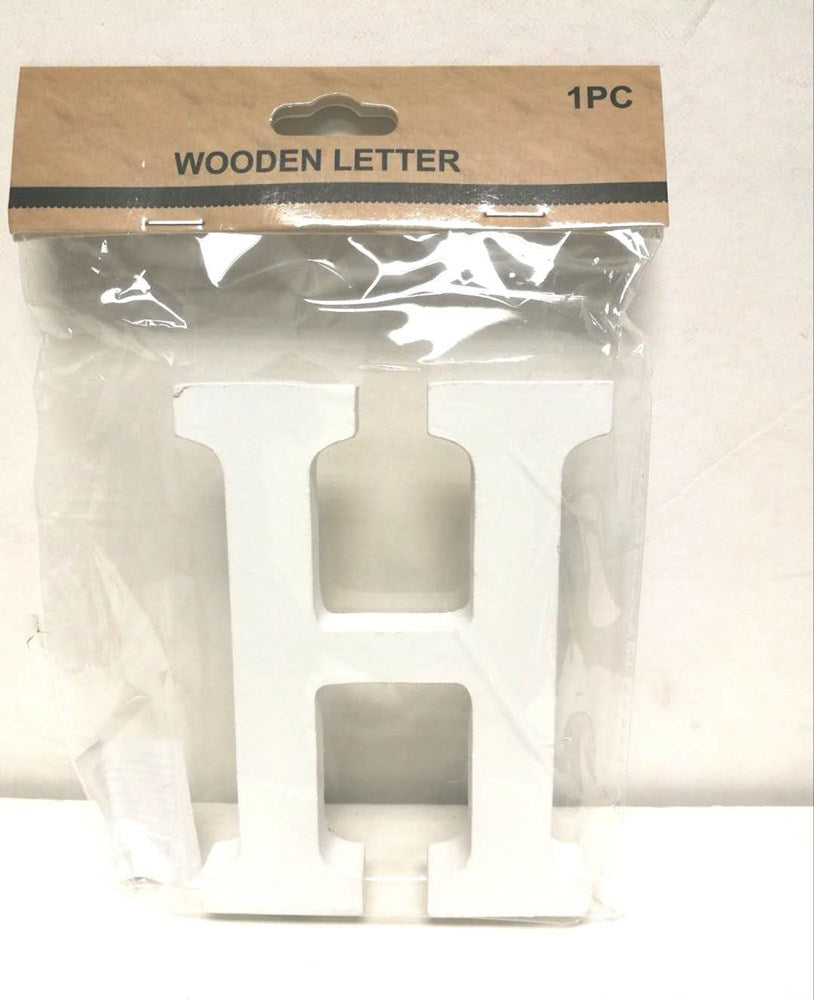 White wooden uppercase letter H with smooth finish in clear plastic packaging.
