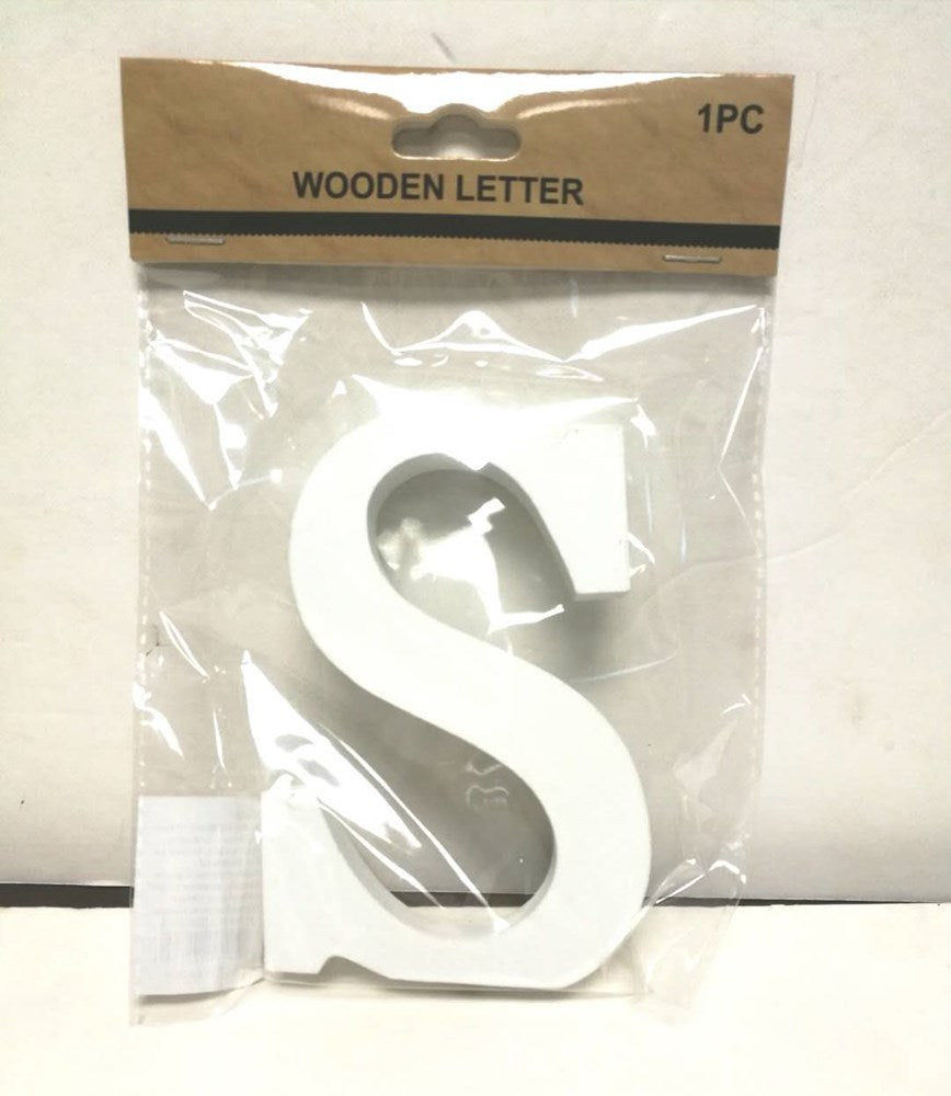 White wooden letter S with smooth surface in clear plastic and cardboard packaging.
