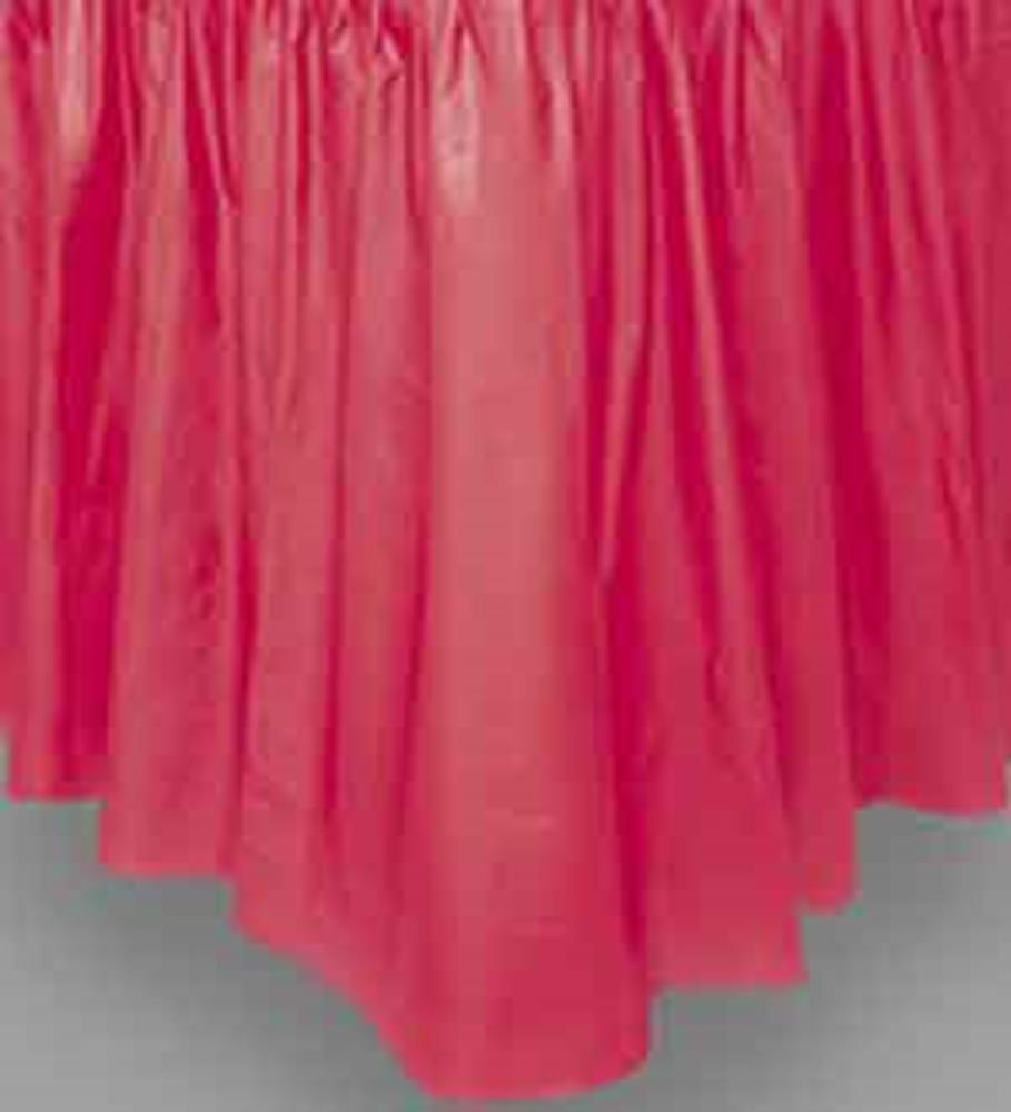 Ruby red plastic tableskirt with gathered, pleated texture and smooth finish.