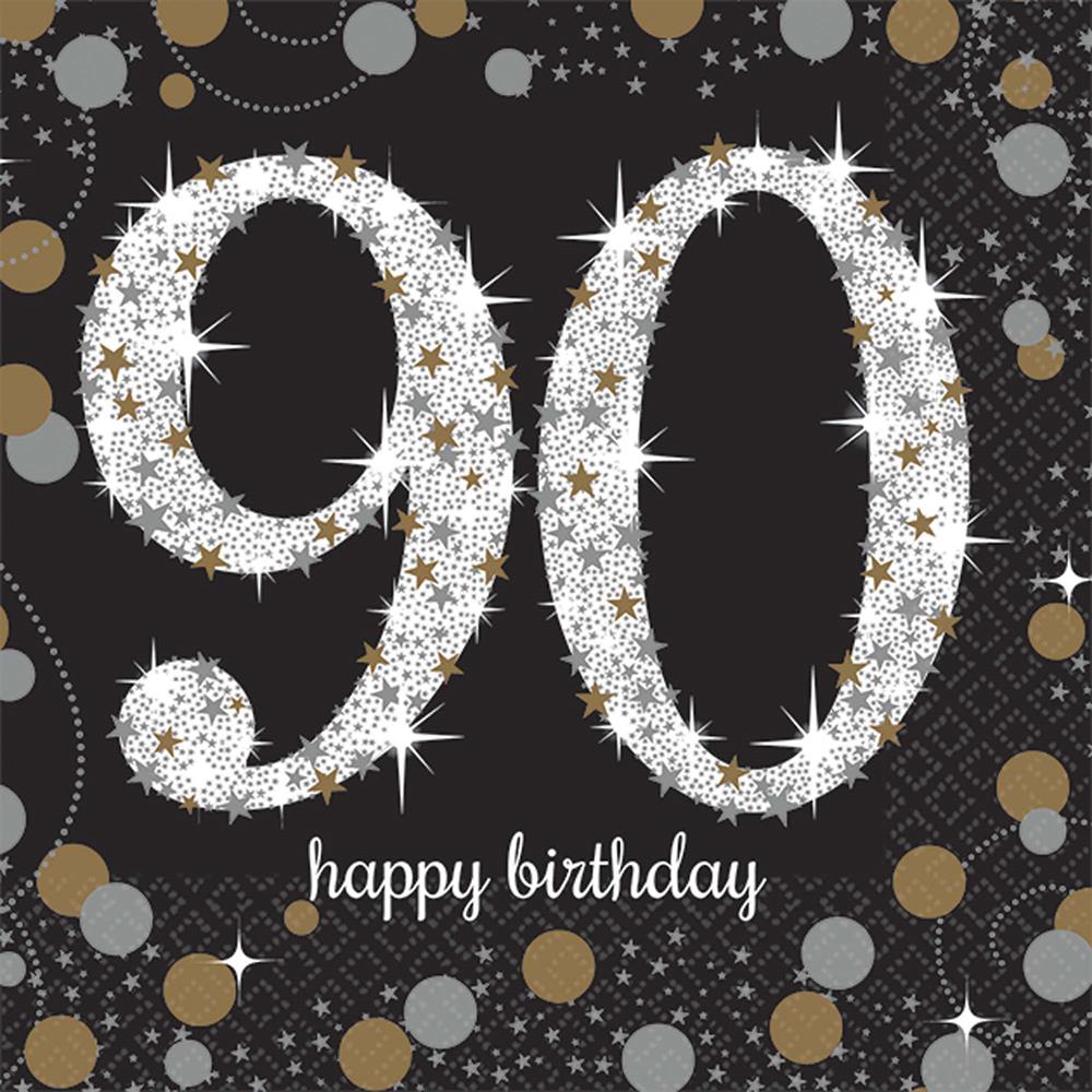Black beverage napkin with sparkling silver "90" and gold stars, "happy birthday" text, and gold and silver confetti design.