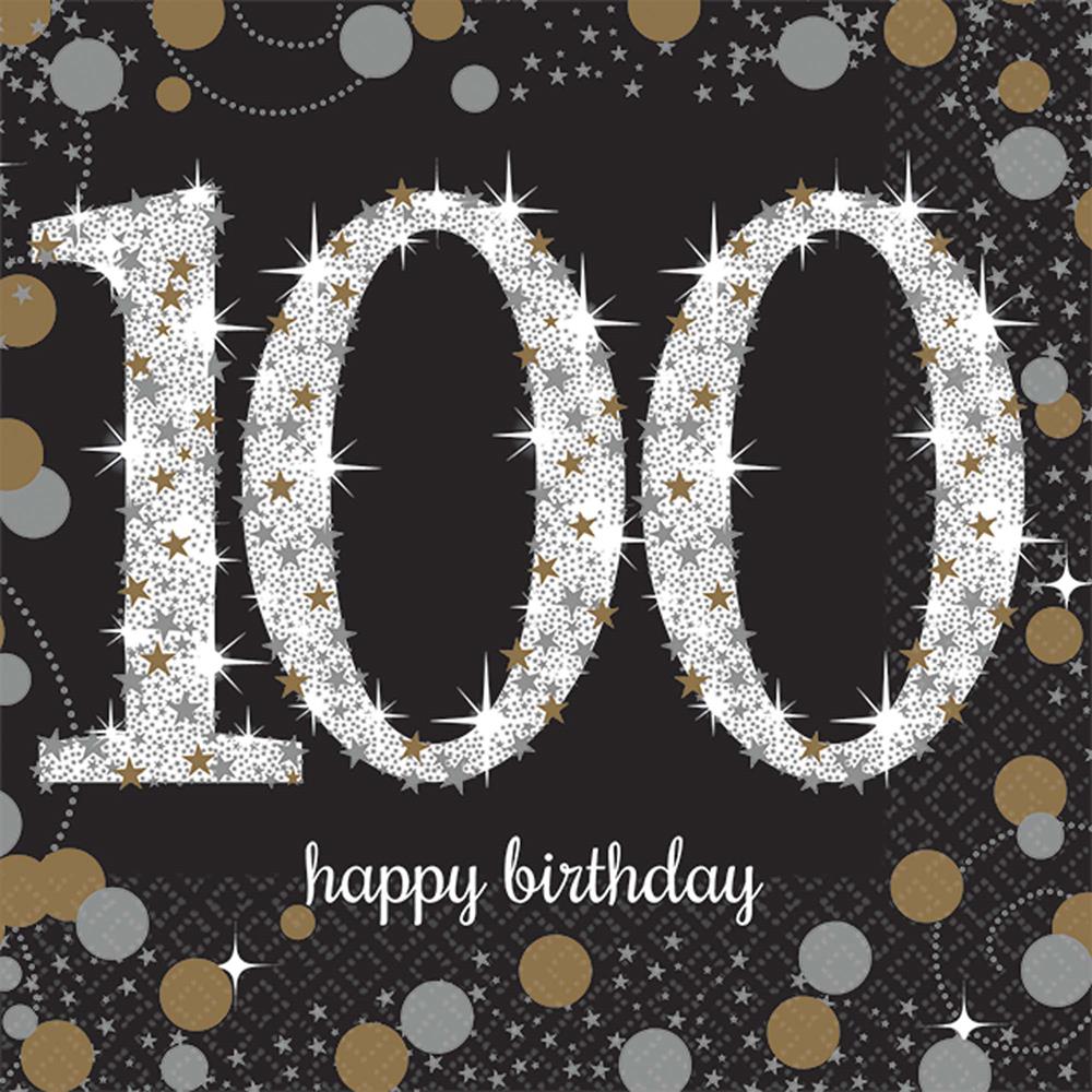 Black napkin with sparkling white "100" and gold and silver confetti dots, "happy birthday" text in white cursive.