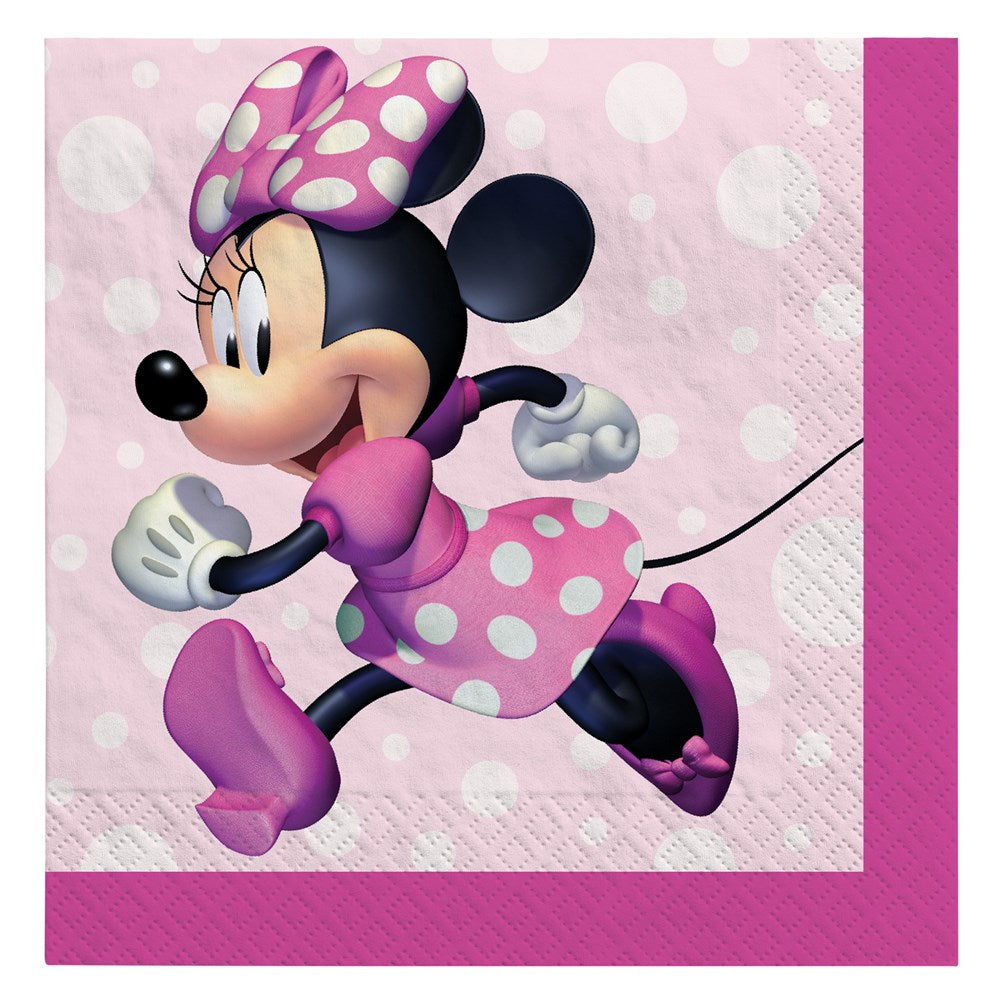 Pink beverage napkin featuring Minnie Mouse in a pink polka-dot dress and bow with white gloves.