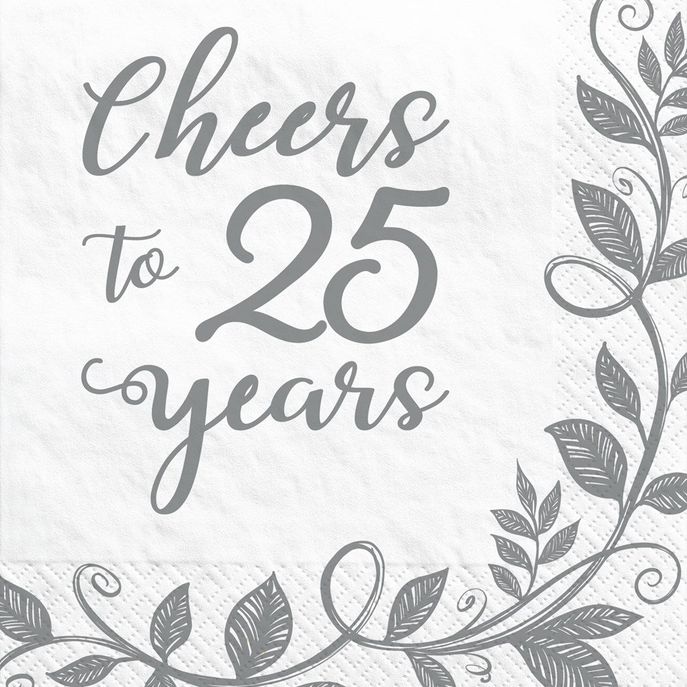 White beverage napkin with silver script text "Cheers to 25 years" and decorative silver leaf border.