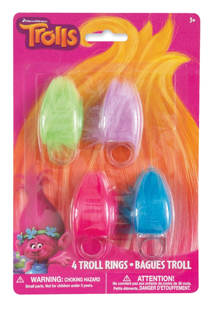 Set of four colorful translucent plastic Troll rings in green, purple, pink, and blue on branded pink and orange card.