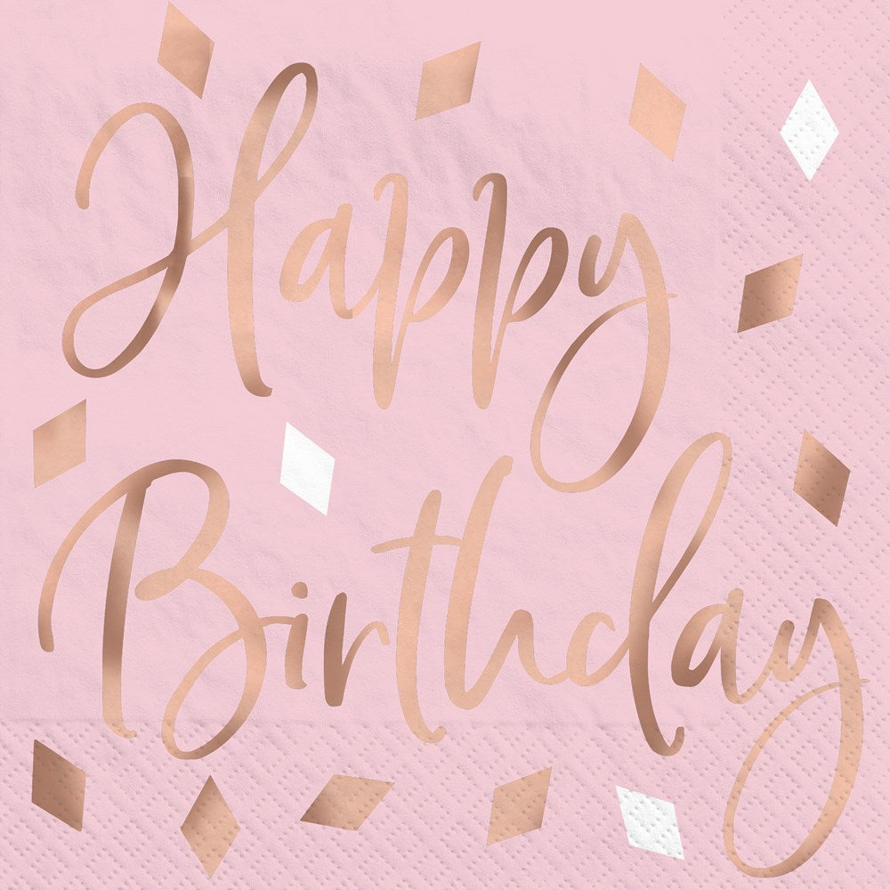 Blush pink paper napkin with rose gold "Happy Birthday" script and metallic diamond confetti design.