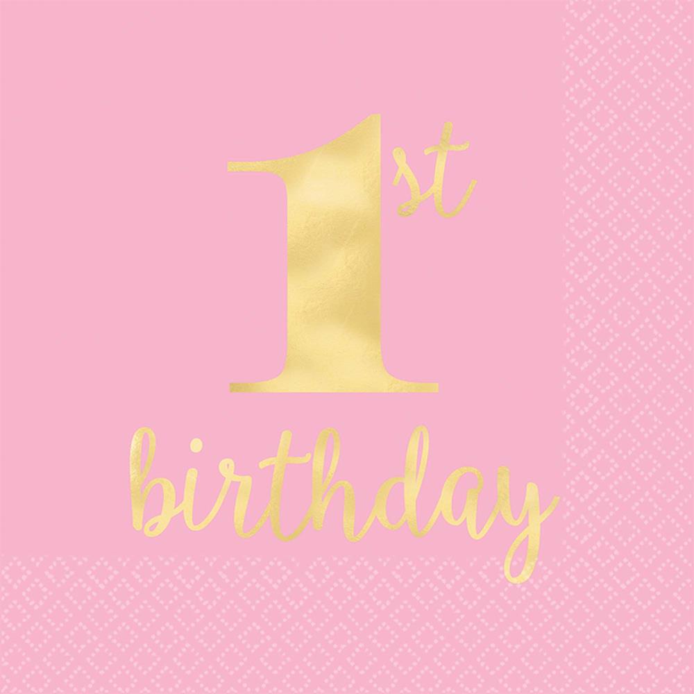 Pink luncheon napkin with gold foil "1st birthday" script and subtle geometric pattern background.