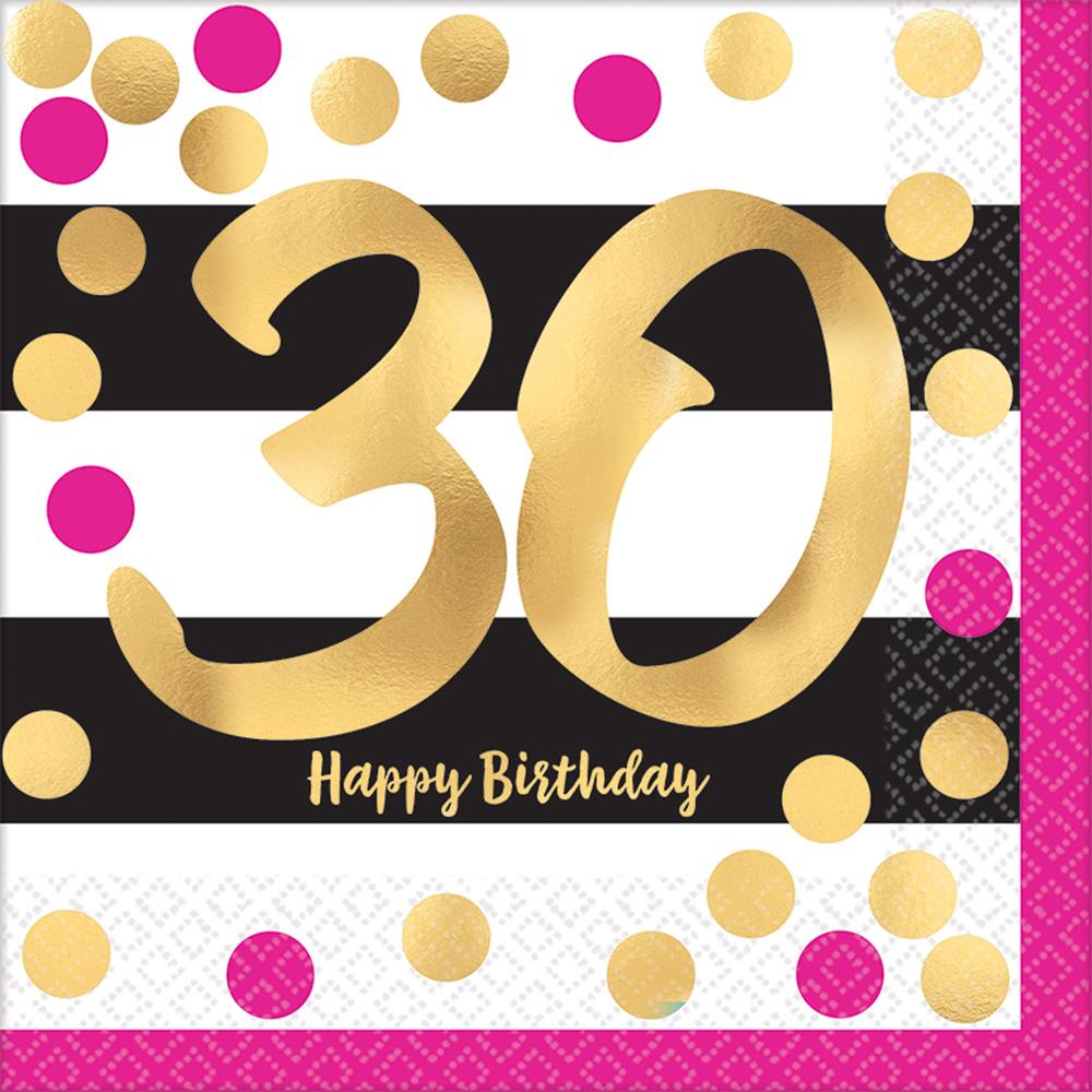 White napkin with large gold "30" and "Happy Birthday" text, decorated with pink and gold polka dots.