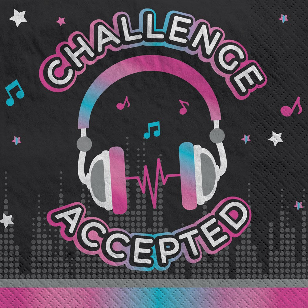Black luncheon napkin with colorful headphones graphic and "Challenge Accepted" text in gradient pink and blue letters.