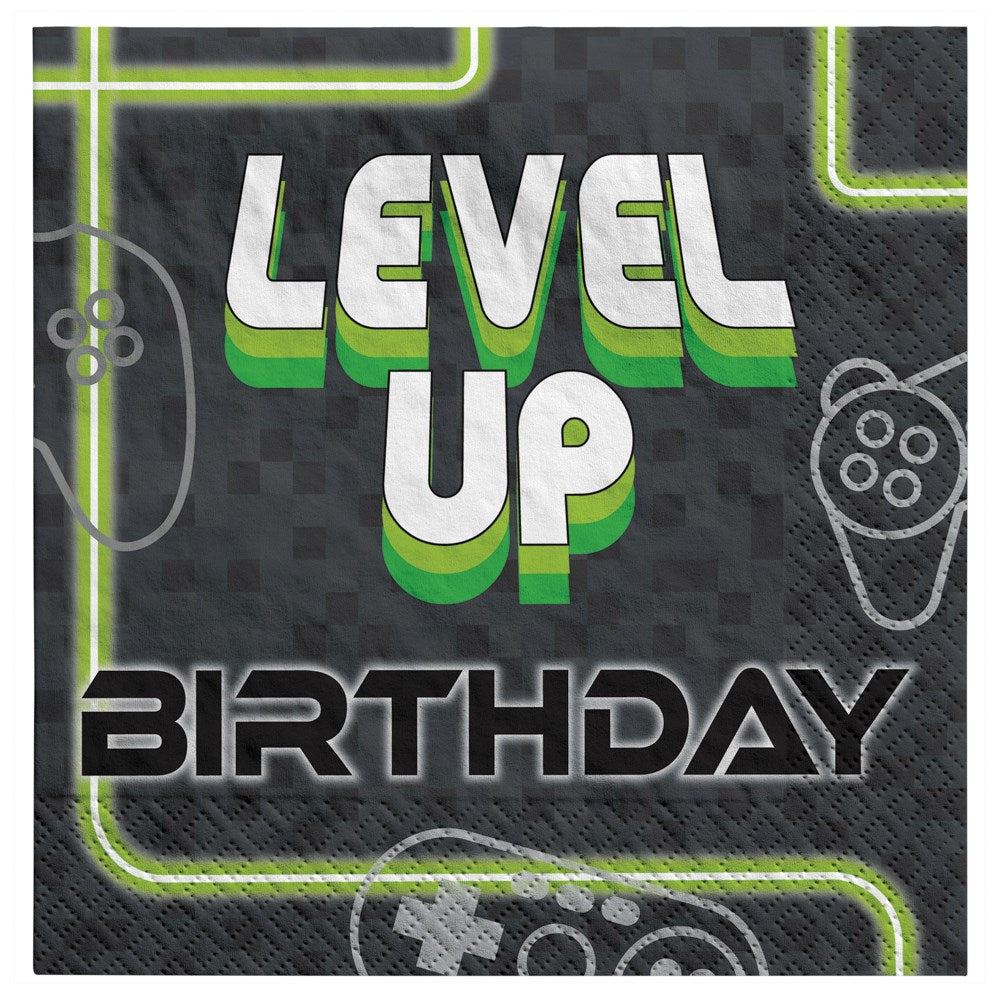 Black luncheon napkin with neon green and white "Level Up Birthday" text and video game controller outlines.