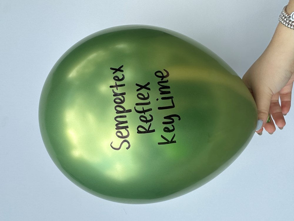 Glossy key lime green latex balloon with "Sempertex reflex key lime" printed in black text.