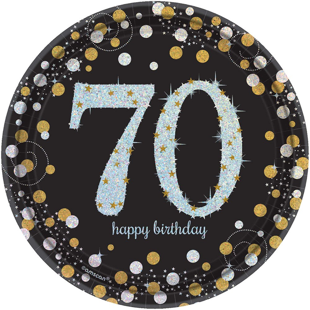 Black round plate with large sparkling blue "70" and gold and silver confetti dots, "happy birthday" text.