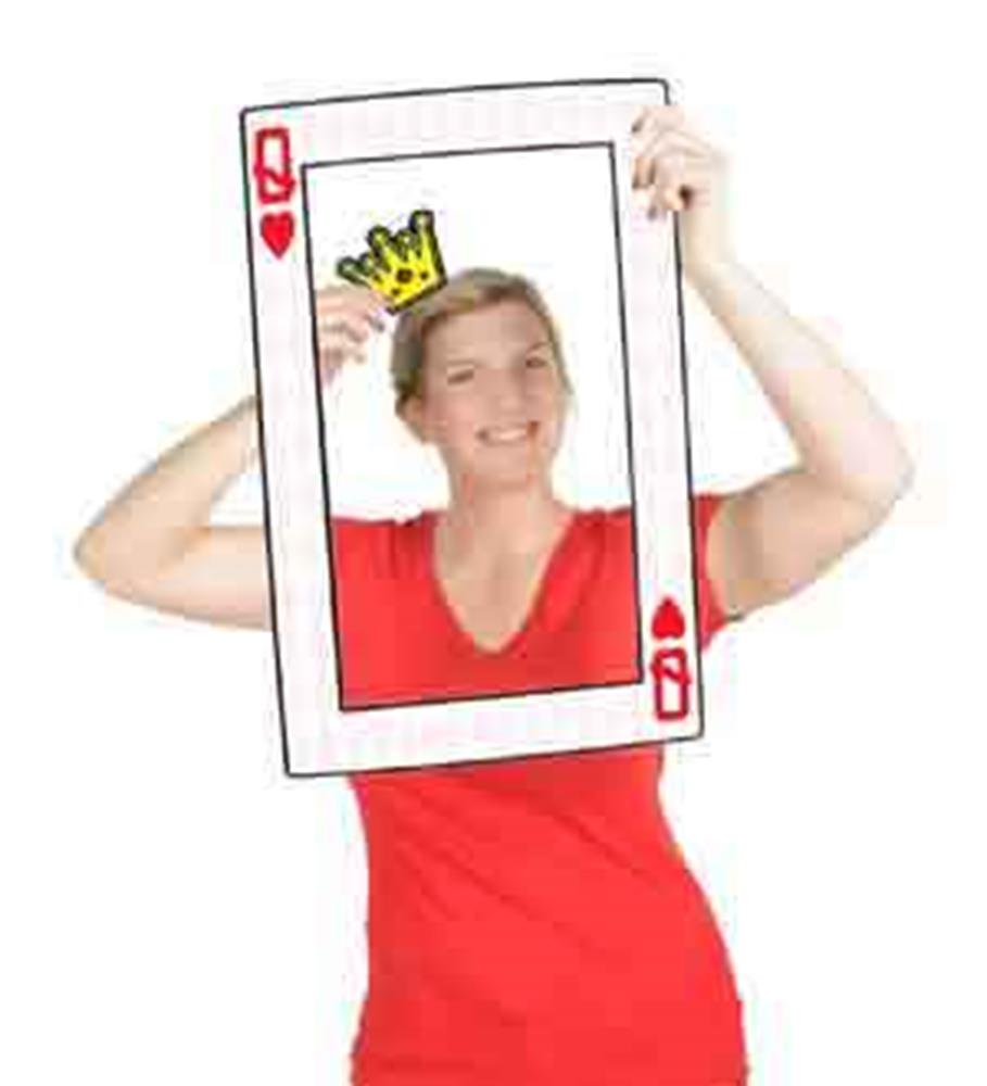 Woman in red dress holding oversized Queen of Hearts casino playing card photo frame with crown graphic.