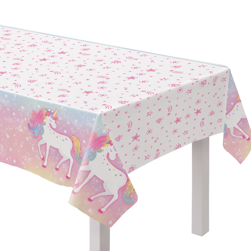 Rectangular plastic table cover with white background, pink stars, and colorful unicorns along the edges.