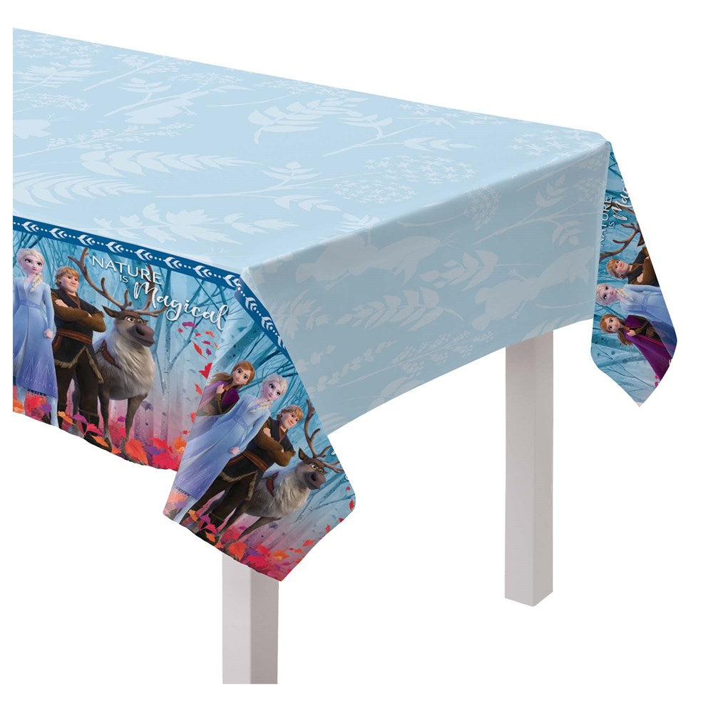 Light blue plastic tablecover with white snowflake patterns and Frozen 2 character designs on the edges.