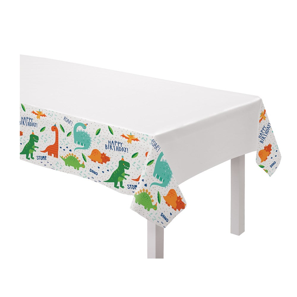 White plastic tablecover with colorful dinosaur illustrations and "Dino-Mite" text along edges.