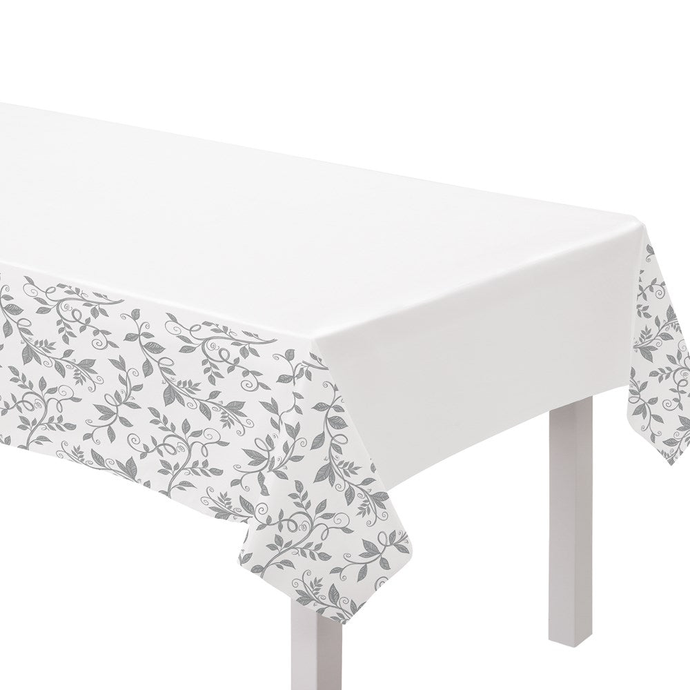 White plastic table cover with silver floral border design for 25th anniversary celebrations, 54x102 inches.