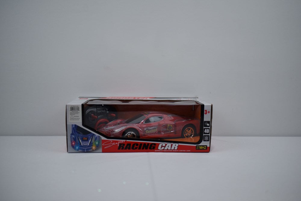 Red and black remote control racing car toy in clear plastic packaging with graphic label.