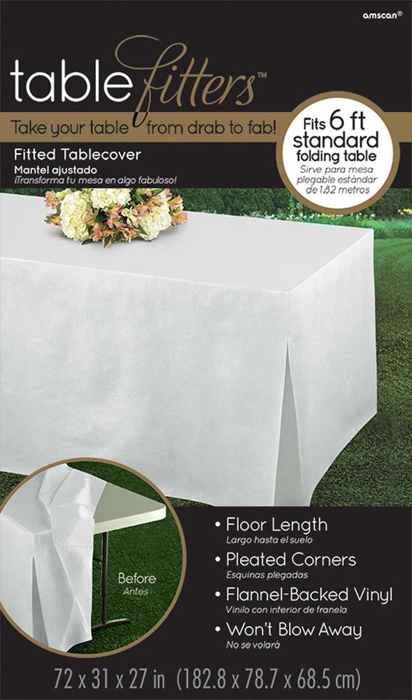 White flannel-backed vinyl table cover draped over rectangular folding table outdoors.
