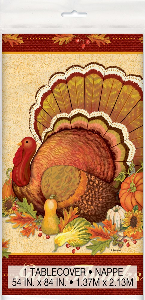 Beige rectangular tablecover with a large colorful turkey, autumn leaves, pumpkins, and gourds design.