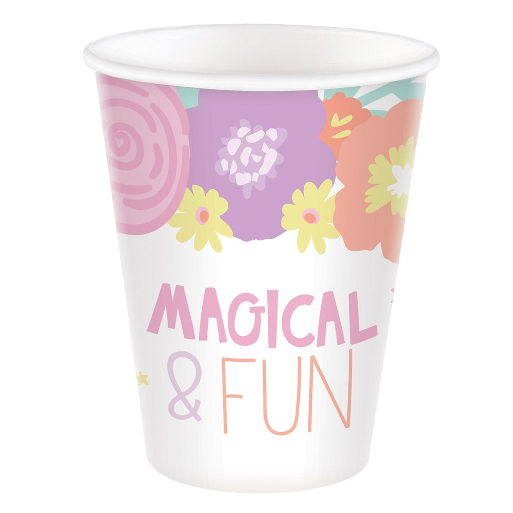 White paper cup with pink and orange floral designs, purple background, and "Magical & Fun" text in pastel colors.