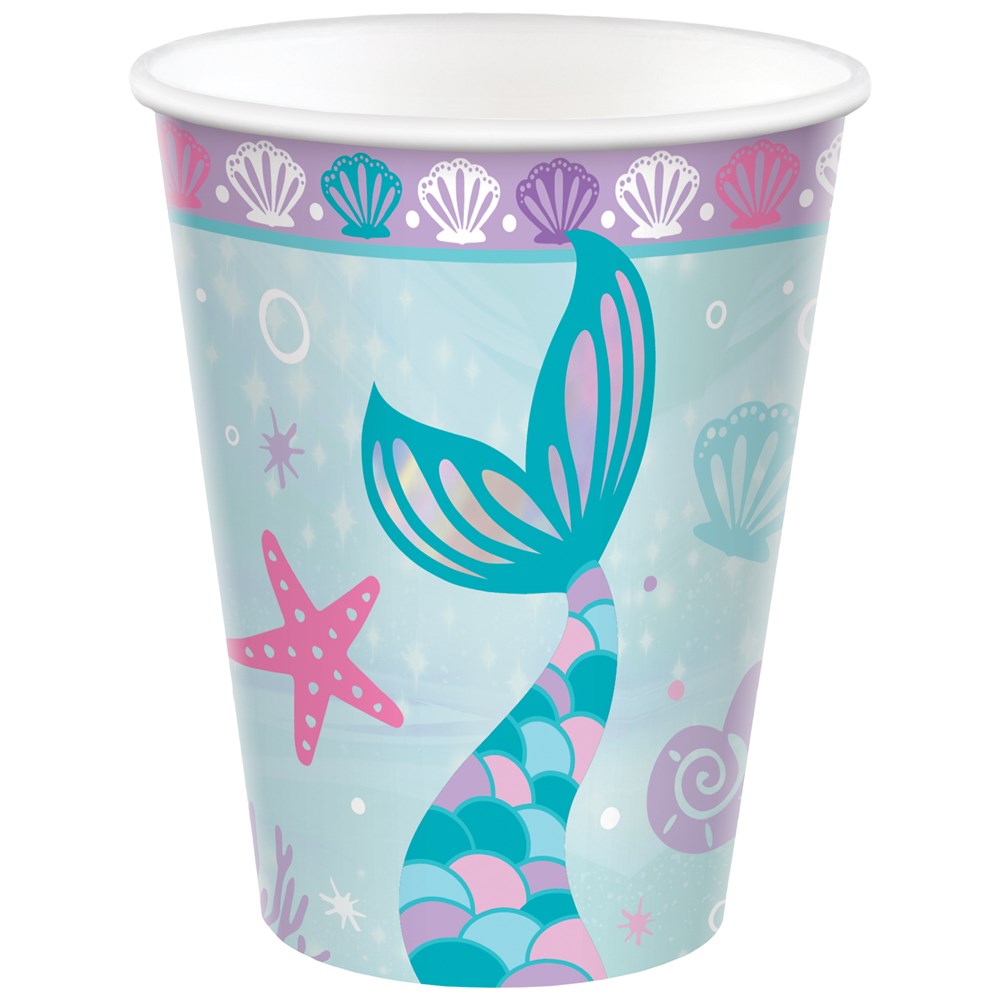 Light blue disposable paper cup decorated with a teal and purple mermaid tail, pink starfish, shells, and bubbles.