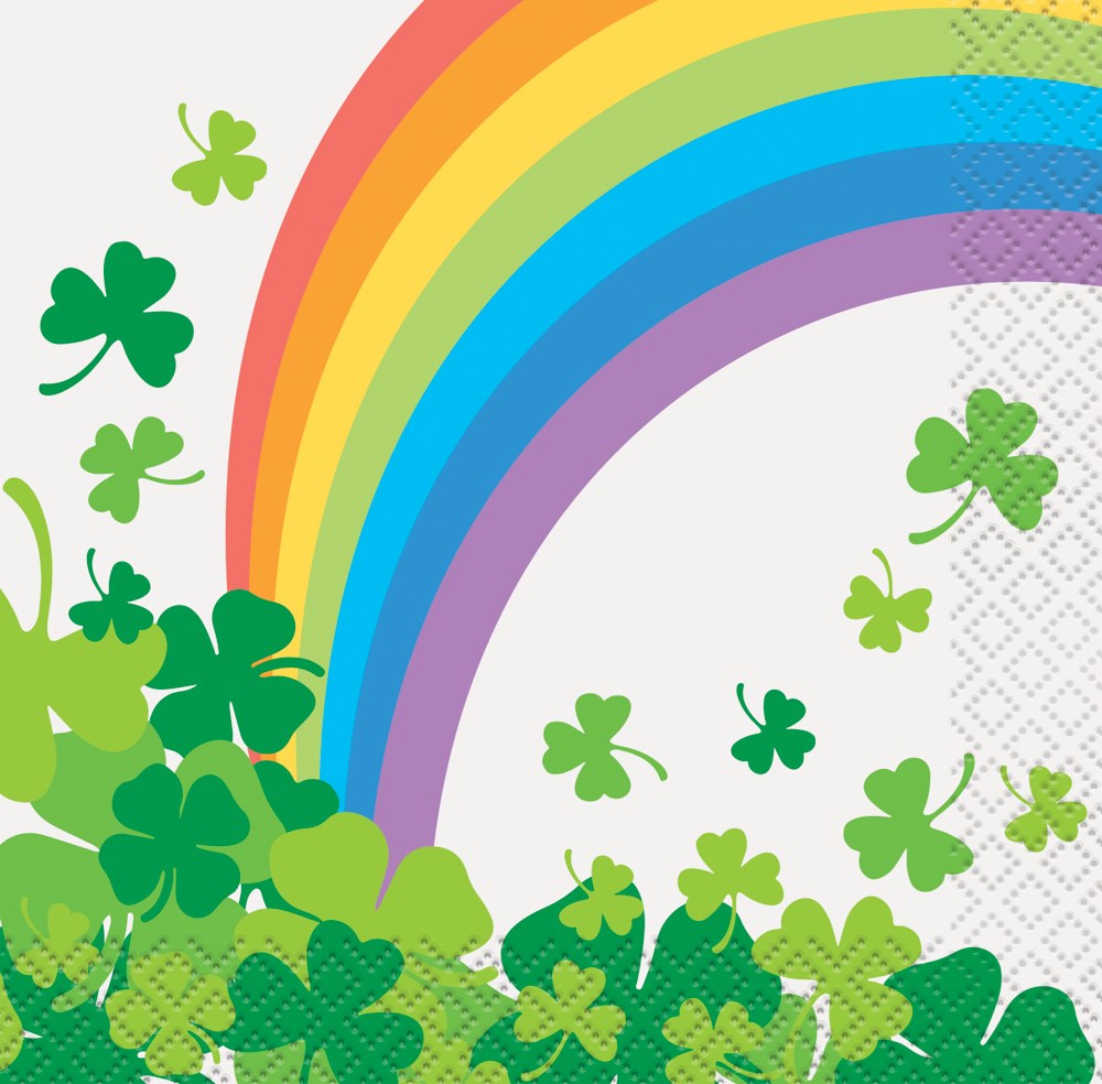 White beverage napkin with colorful rainbow arc and scattered green shamrocks on bottom and sides.