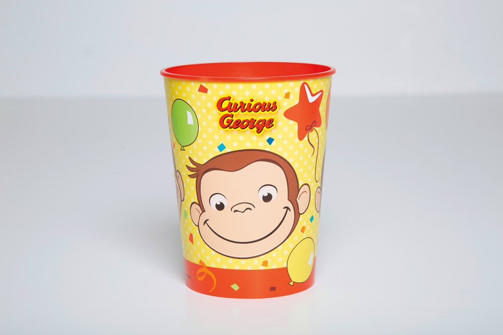 Yellow plastic cup with Curious George face, red rim, and colorful balloons and stars design.
