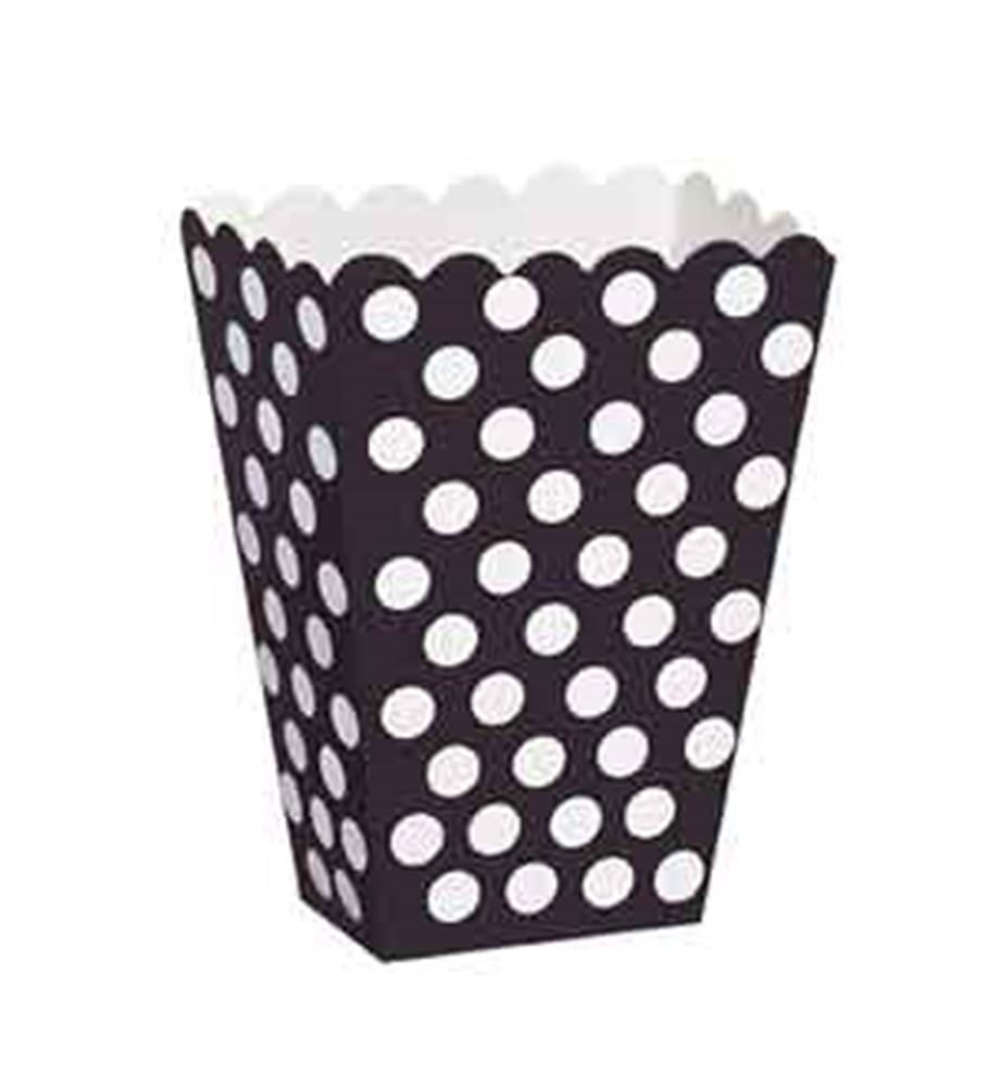 Black treat box with white polka dots and scalloped top edge.