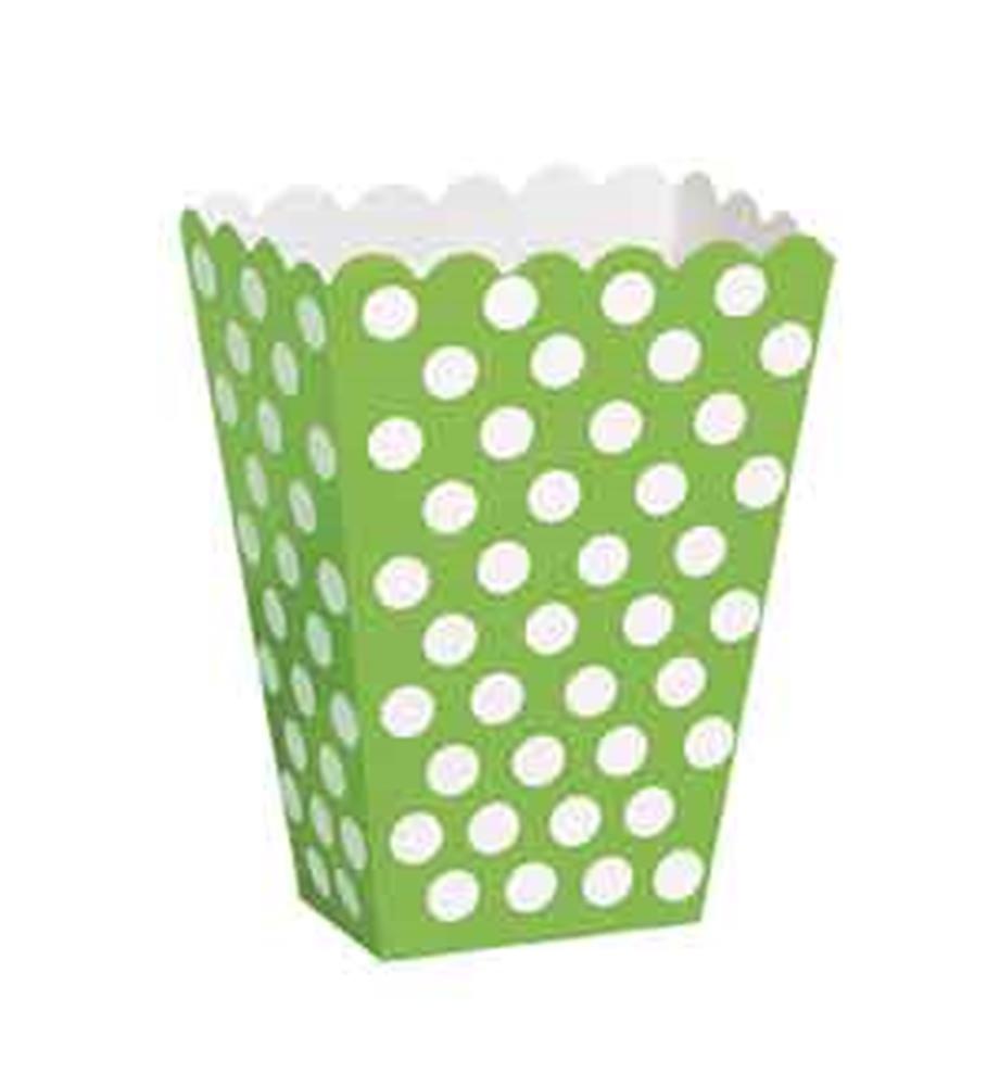 Lime green paper treat box with large white polka dots and scalloped top edge.