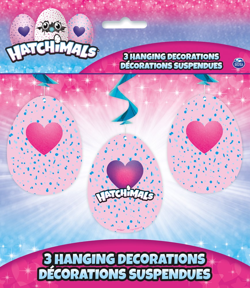 Three pink Hatchimals-themed hanging swirl decorations with heart cutouts and blue confetti dots.