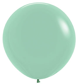 Large round latex balloon in pastel dusk green tea color, smooth surface, inflated.