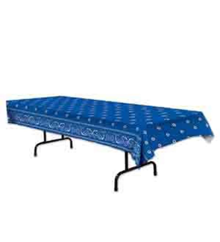 Blue tablecover with white paisley and bandana patterns, rectangular shape, fabric material.
