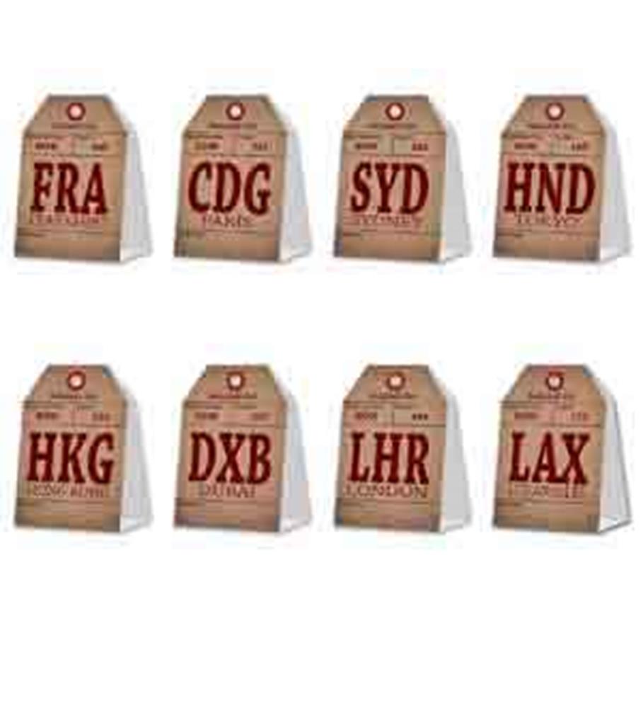 Set of brown kraft paper table cards with red airport codes and city names in bold typography, each shaped like a luggage.