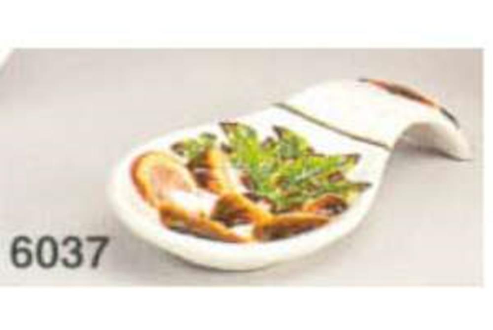 Ceramic spoon rest shaped like a mushroom with brown cap and painted green leaves and mushrooms on the base.