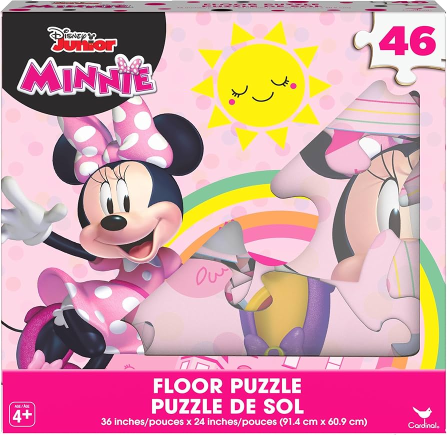46-piece Minnie Mouse floor puzzle with bright pink polka dot bow, rainbow, and smiling sun, packaged in pink box.